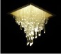 Lampadario “Ice chandelier”.<br />Materiale: plexiglass e alluminio.<br />Finitura: naturale.<br />Illuminazione: led